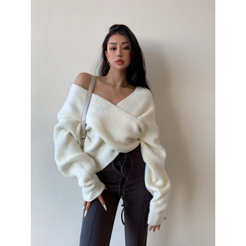 

European and American autumn and winter one neck cross shoulder irregular sweater women's new loose short base knitted sweater