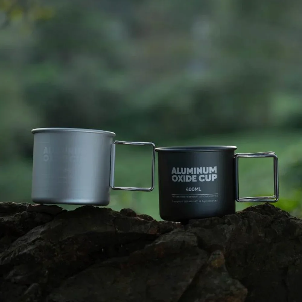 

Набор из двух туристических кружек 300 мл и 400 мл из алюминиевого сплава, совместимых с открытым огнем, со складными ручками и возможностью складывания для хранения в путешествиях.