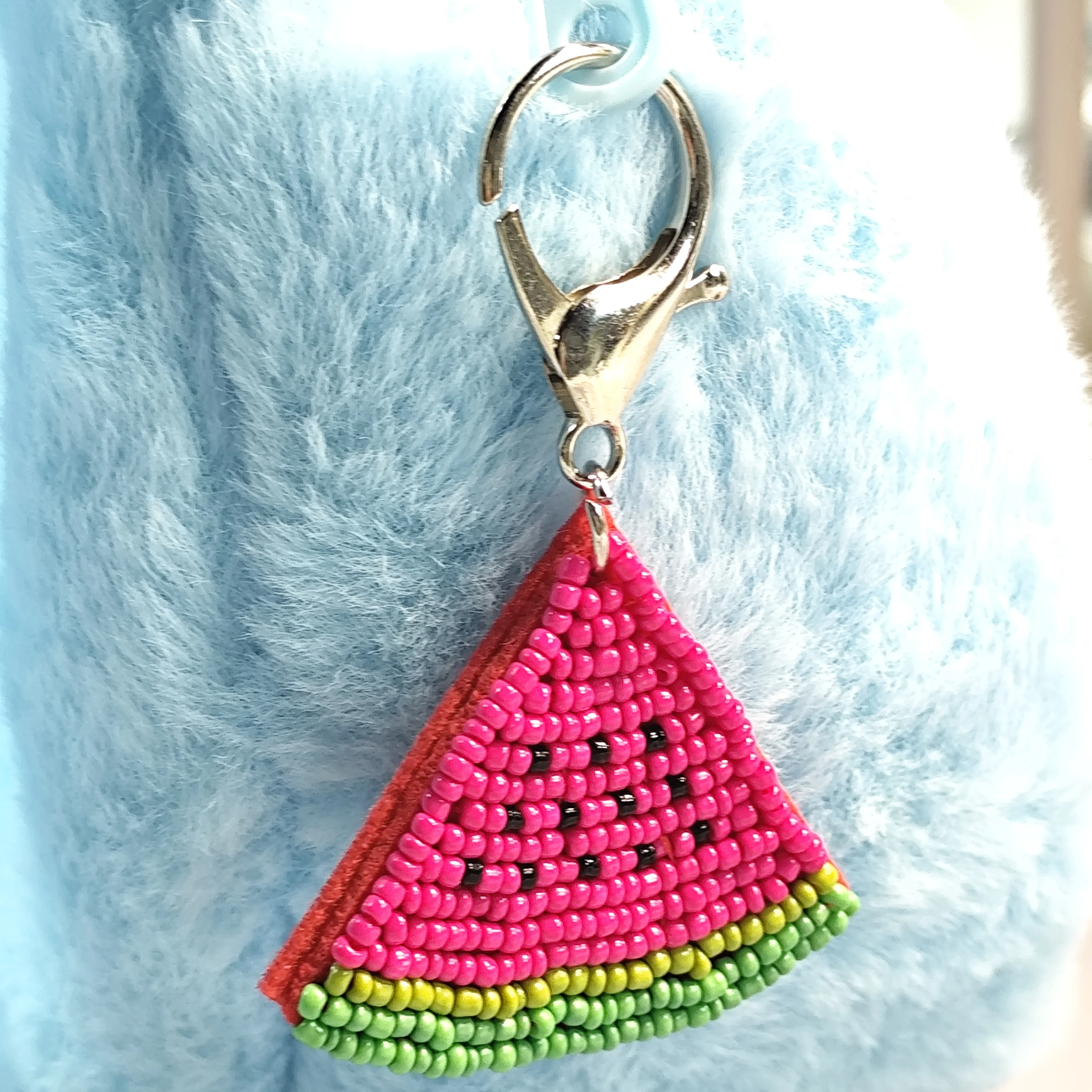 This beaded watermelon slice keychain is super cute! Colorful beads form a vivid watermelon.