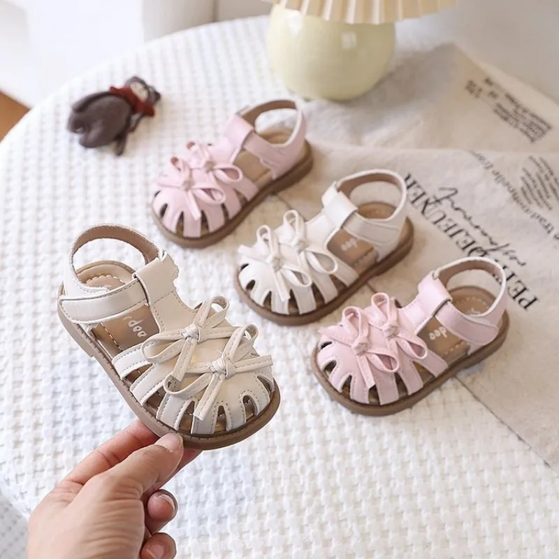 

Girls' beach sandals 2026 summer new style with double bows design, toe-closing design, simple and fashionable beach shoes