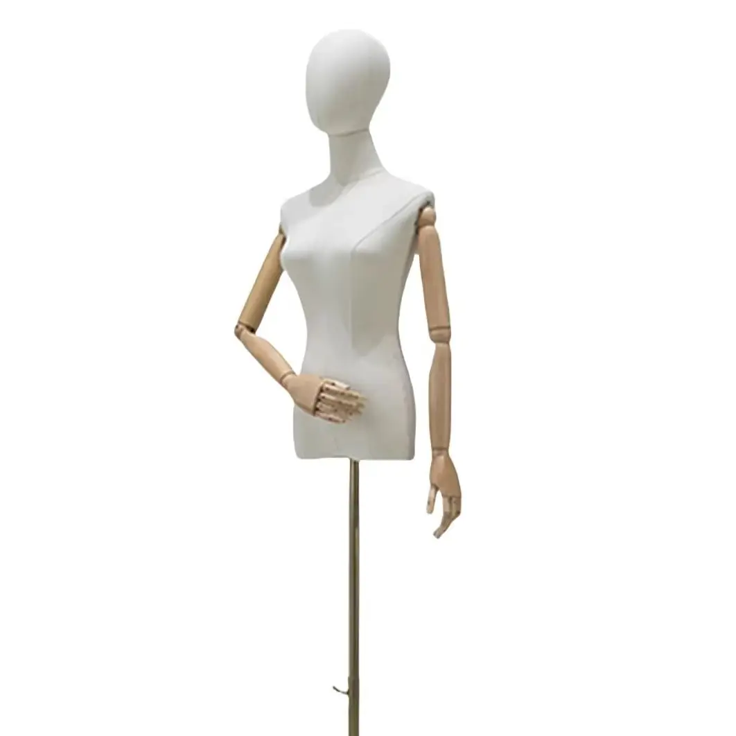 Female mannequin torso hanger and wedding dress rack in the showcase