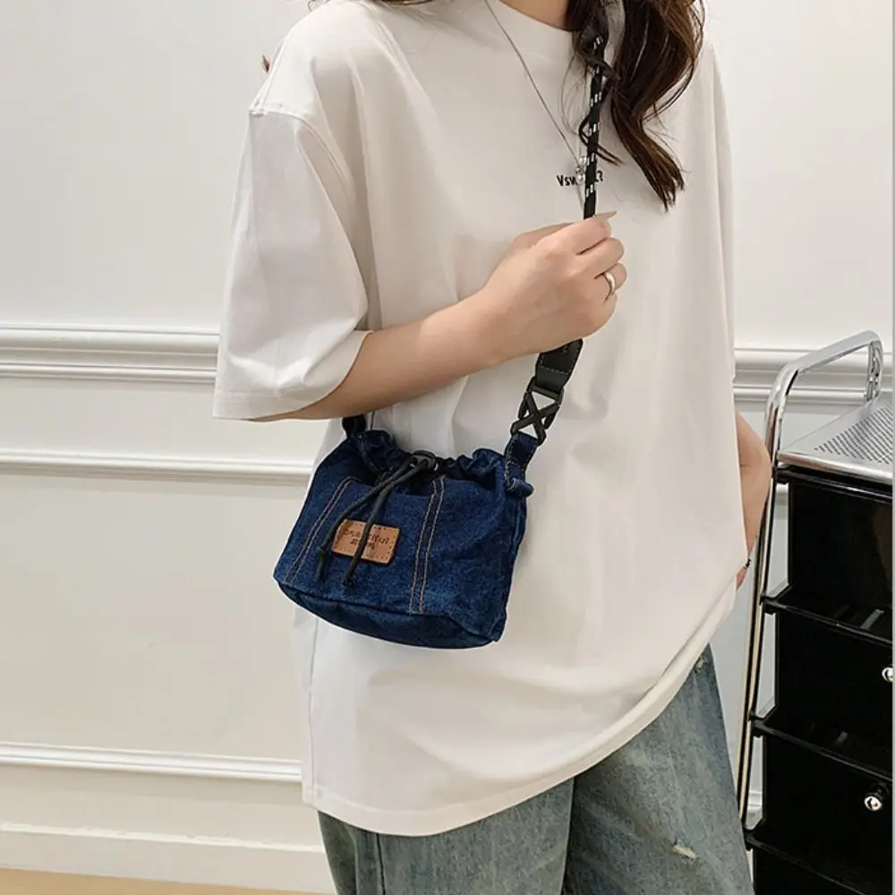 シンプルなヴィンテージ巾着クロスボディバッグ大容量カジュアルデニムキャンバスバッグハンドバッグ無地ジーンズショルダーバッグ女性