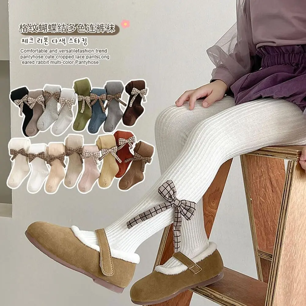 Girls leggings spring and autumn thin Korean bow baby solid color children's pantyhose wholesale leggings