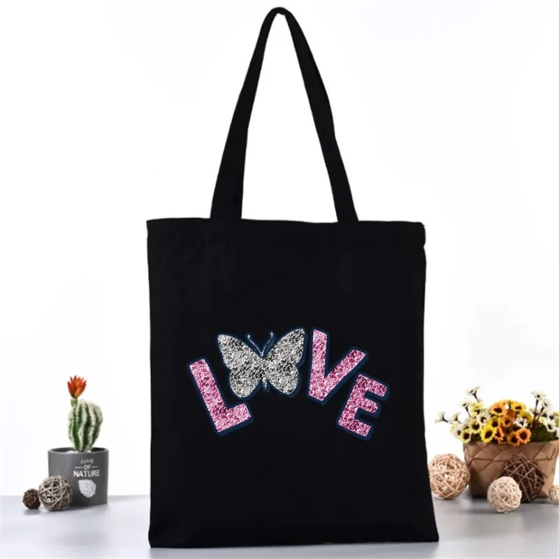 Bolsa de Mano de Lona con Estampado de Mariposas y Brillo LOVE, Bolsa de Hombro Negra Estética, Bolsa de Mano Casual Reutilizable para Mujer