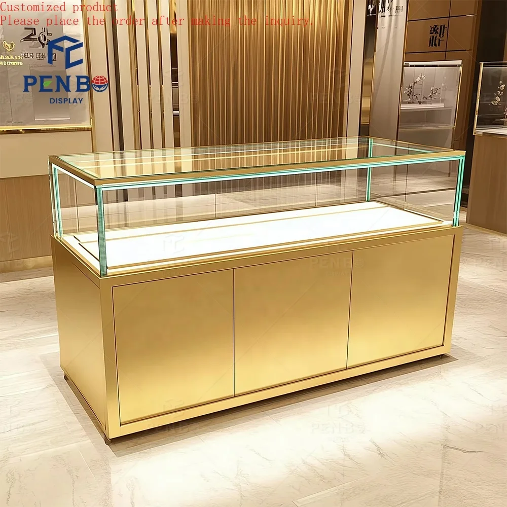 

Custom.Luxury Modern Jewelry Showcase Cabinet MDF Wood Tempered Glass LED Light Jewelry Display Table Golden Jewelry Showcase