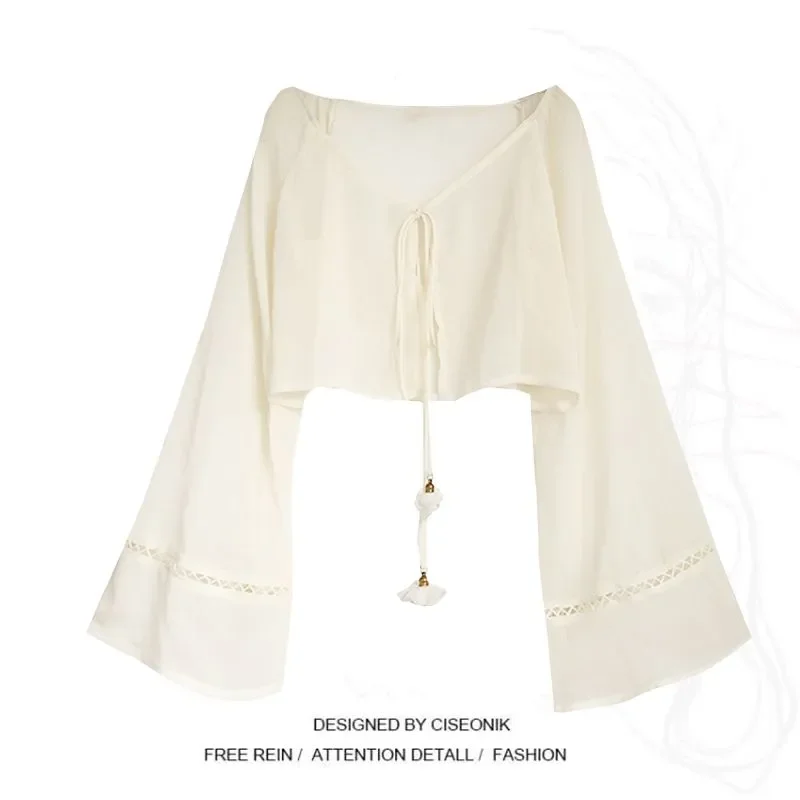 ملابس على الطراز الصيني الجديد لصيف 2025 بلوزة واقية من الشمس جديدة تنورة بحمالات ضيقة طقم مكون من قطعتين