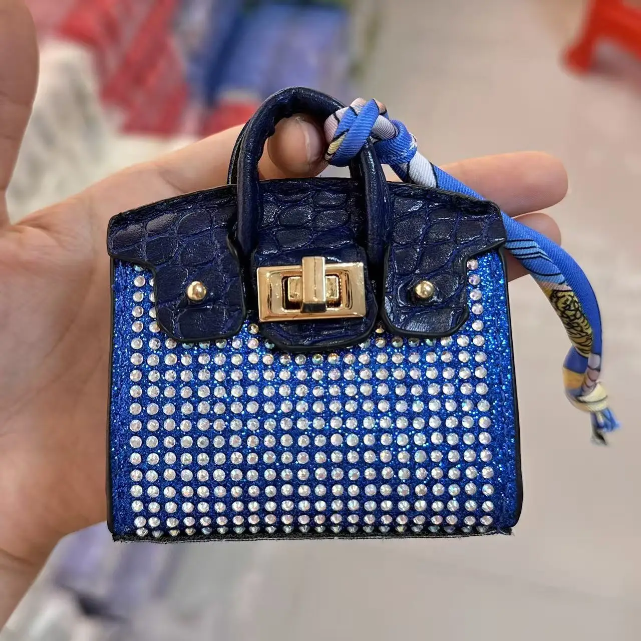 1 Stück 2026 neue Schlangenhaut-Mini-Multifunktionstasche, Joker-Münzbörse, Anhänger, Schlüsselanhänger, Bluetooth-Kopfhörertasche – Detail 2