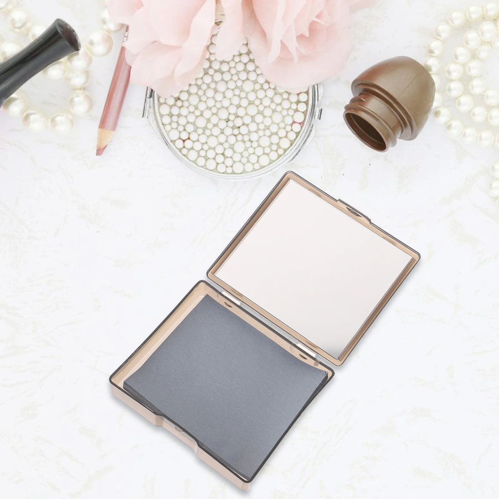 مجموعة واحدة من ورق النشاف المحمول للبشرة الدهنية، أوراق امتصاص الزيت، تصميم مدمج للوجه لاستخدام المواد الآمنة للمكياج