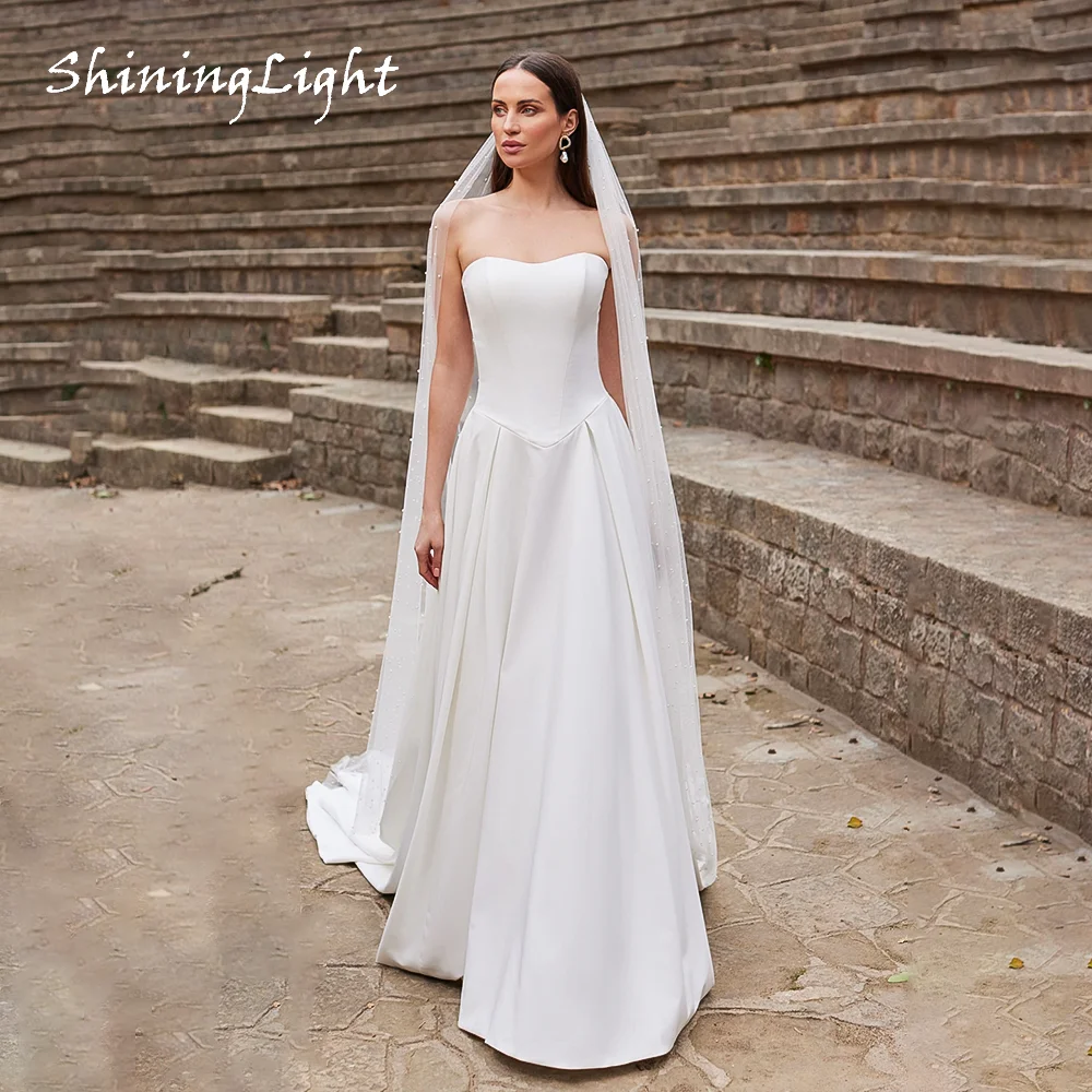 

ShiningLight Strapless Satin Wedding Dress with Basque Waist Elegant A-line Corset Wedding Dress for Bridal Vestidos Customized