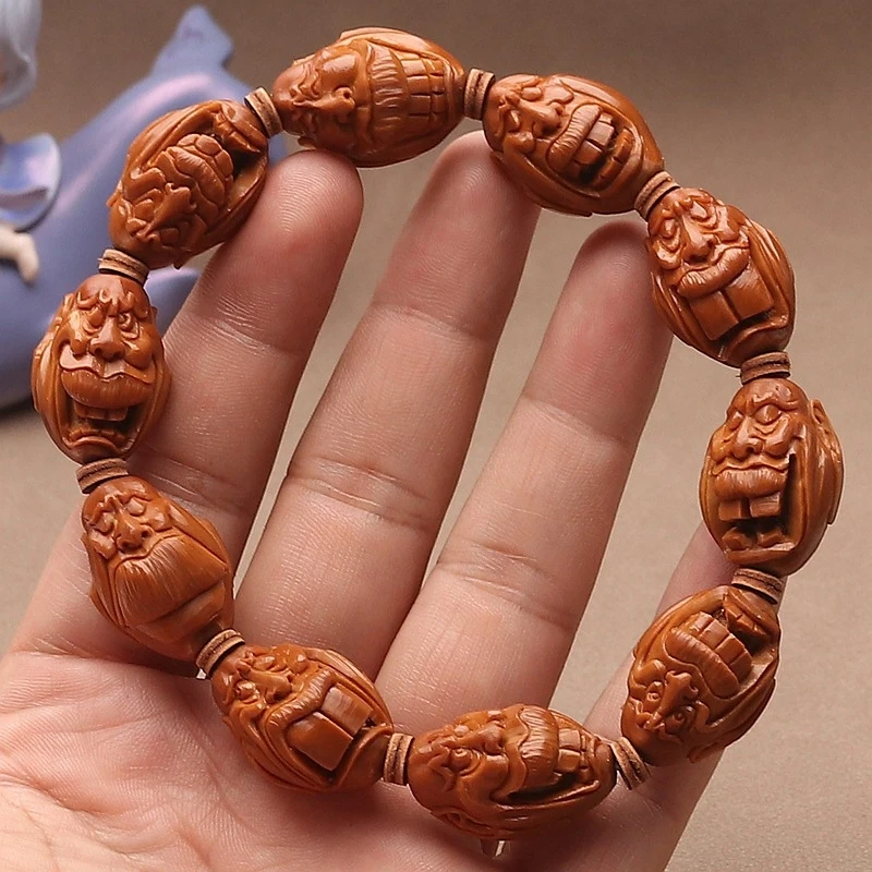 Natural Olive Stone Handmade Quirky Face Bracelet With Large Protruding Teeth And Hollow Design