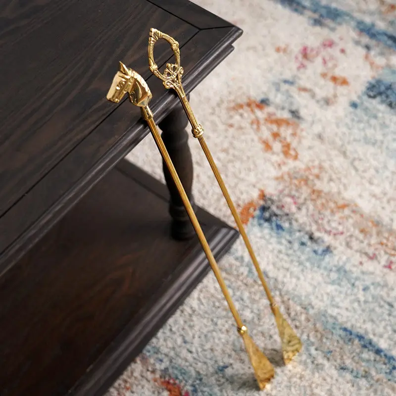 Handmade shoe lifter, luxury home furnishing, European-style golden horse head, creative brass, long durable shoehorn.