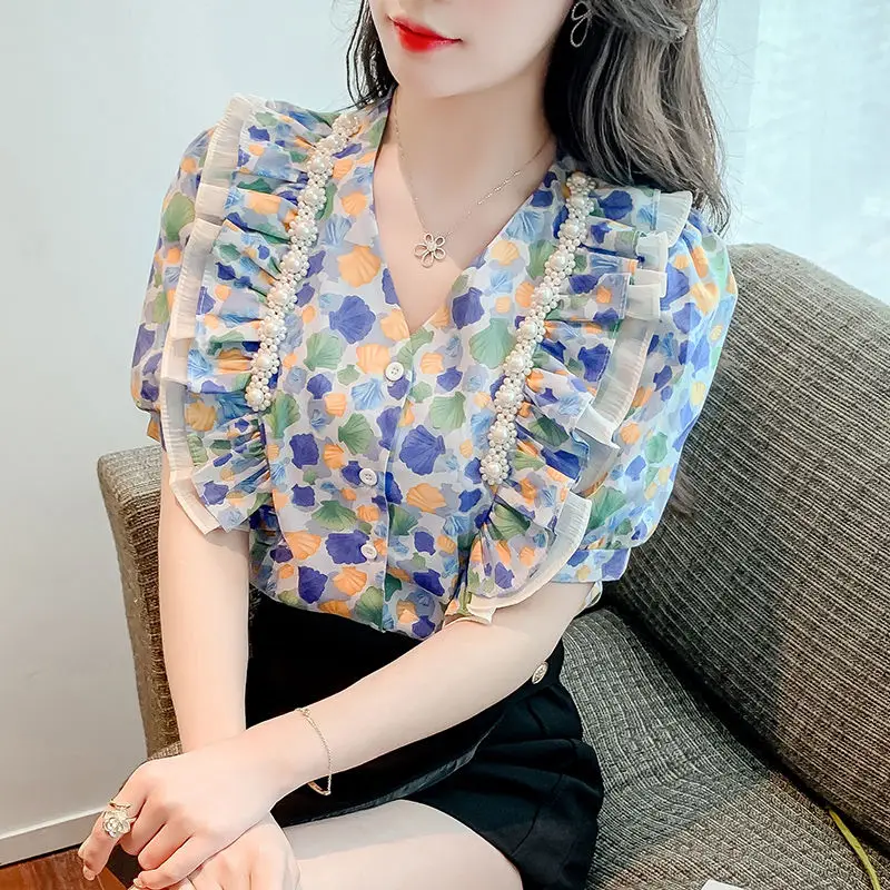 Fashion Pockets Spliced Elegant V-Neck Printed Shirt Female Clothing Chic Pearl Embroidered Flares Summer Single-breasted Blouse