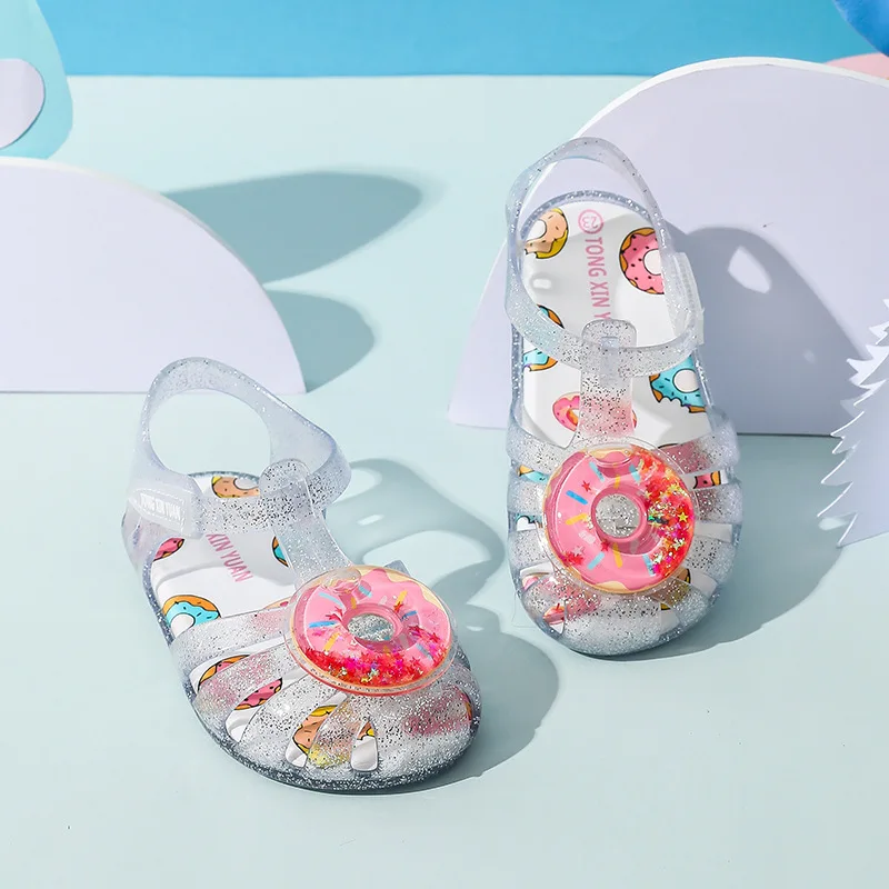 Sandali per ragazze estate principessa 2024 nuovi bambini gelato anguria ciambella scarpe da spiaggia Baby Baotou Jelly Shoes scarpe di cristallo