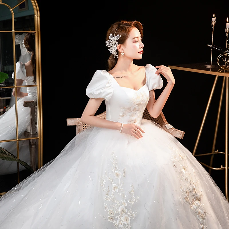 XXN-184 # Trouwjurk baljurk 2025, nieuwe bruids Franse paleisstijl, goedkope groothandel, kantborduurwerk, champagnekloem uit China
