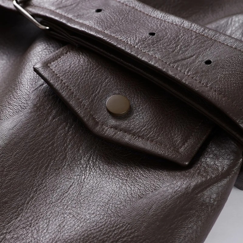 Giacca da donna in PU con cintura con cerniera Design Primavera Autunno 2025 Cappotto in pelle con cinturino corto con colletto rovesciato nuovo stile europeo americano