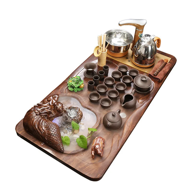 The whole set of home office atomization running water bionic wooden tea tray ceramic purple sand kung fu tea set four-in-one