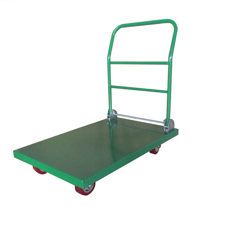 

Logistics handling trolley, green folding flatbed truck, small warehouse.