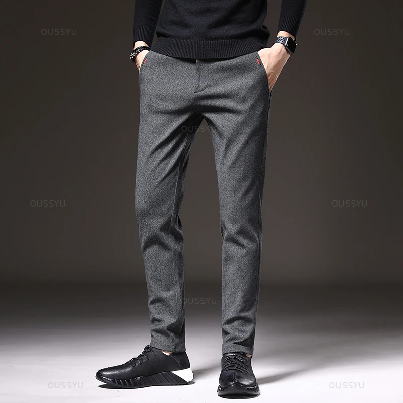 Nuevos pantalones informales de tela cepillada de invierno para hombre, moda de negocios gruesa, pantalones elásticos ajustados de Corea, color gris, azul y negro, 38