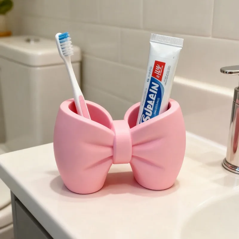 

1pc Bow shaped toothbrush holder pen holder suitable for bathroom storage study desk storage supplies