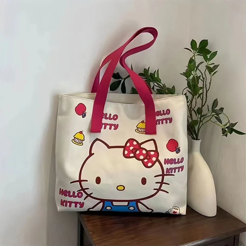 

Hello Kitty Anime Kawaii Sanrio Large Capacity Canvas Bag Cute Cartoon Kt Cat Shopping Shoulder Tote Bag Gifts for Girls