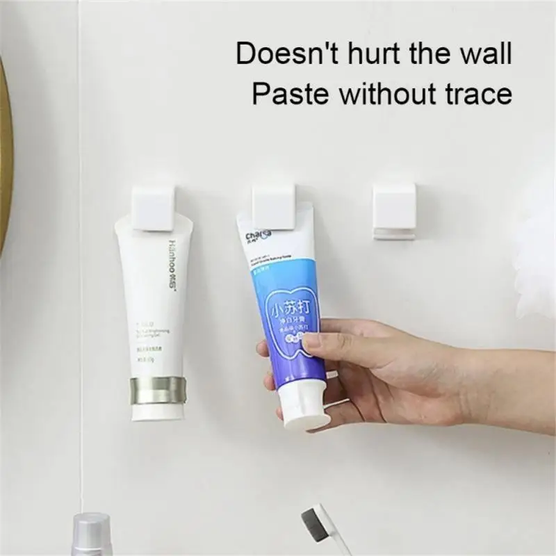 Wall Mounted Toothpaste Rack Bathroom Self Adhesive Hanging Clip Traceless Storage Rack Universal Household Container Organizer