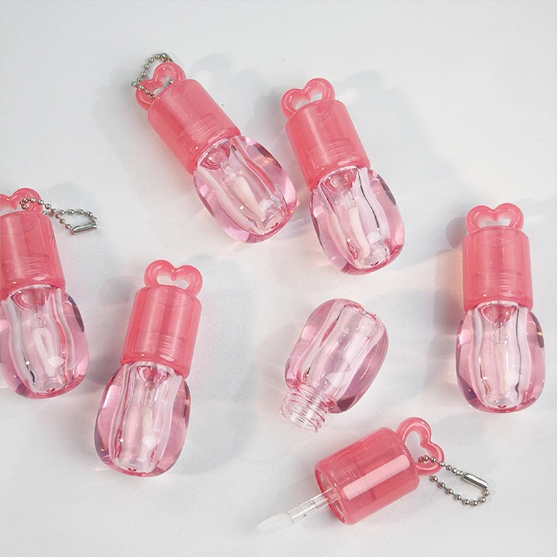 Herzform, hohl, Farbverlauf, Lipgloss-Röhren, großer Zauberstab, Pinsel, Lippenöl-Flaschen, leere Lipgloss-Röhre, Lippenstift-Flaschen, Behälter