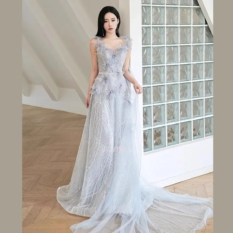 فساتين نسائية زرقاء طويلة لحفلات الزفاف أنيقة مزينة برقبة على شكل حرف v بدون أكمام من التل فستان سهرة فستان حفلات