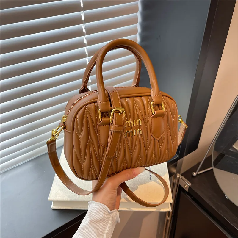 

Light luxury women's bag 2025 new shoulder messenger small square bag bowling change bag pleated bag