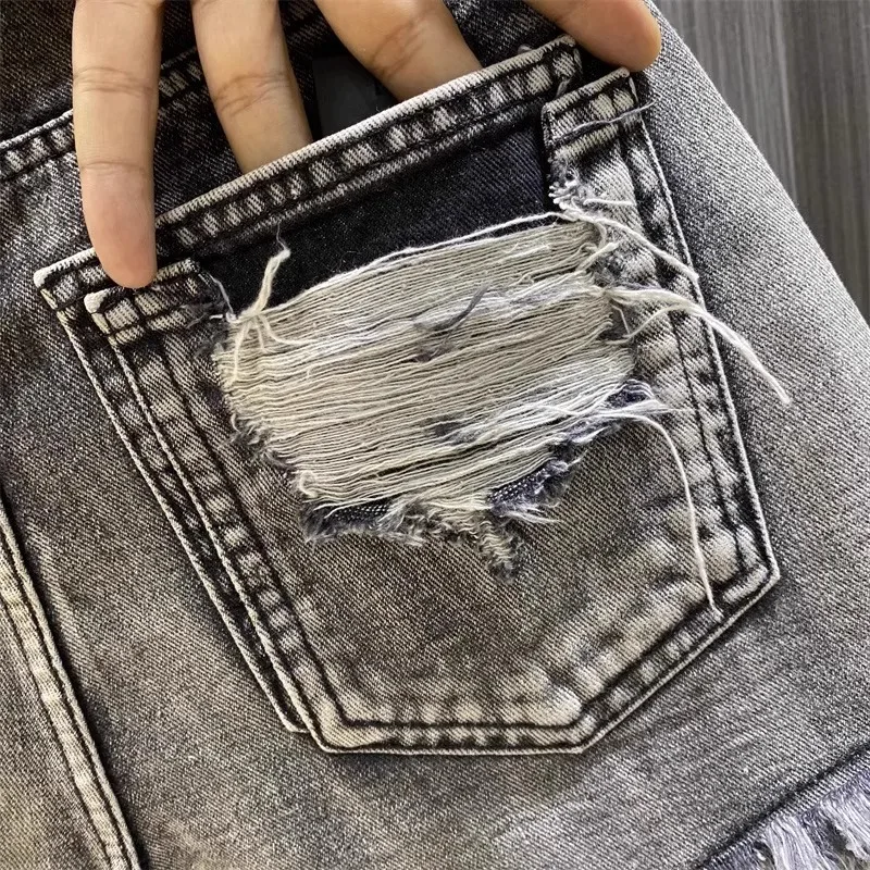 Worn Legs with Rough Edges Washed Black Denim Shorts 2026 Summer New Women Fashion A-line Wide Leg Hole Ripped Denim Shorts