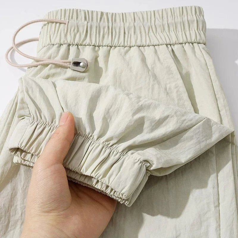 

Летние тонкие быстросохнущие брюки из ледяного шелка для мужчин и женщин, с эластичным поясом на шнурке, свободного кроя, универсальные, длинные брюки...