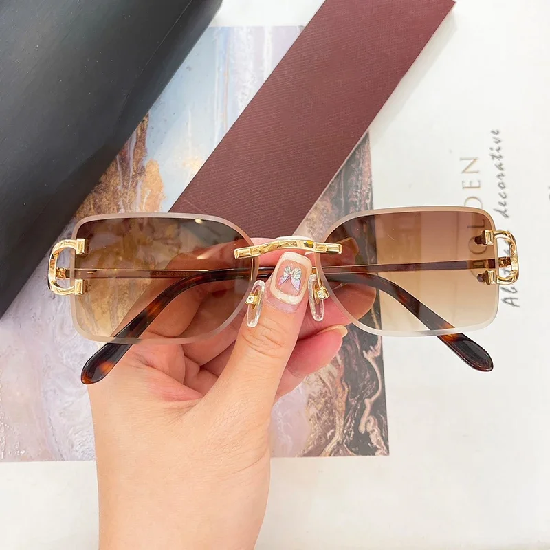 0092O Butterfly-Shaped France Style Rimless Frameless Sunglasses Photochromic Women and Men Outdoor Transit Uv400 Eyeglasses