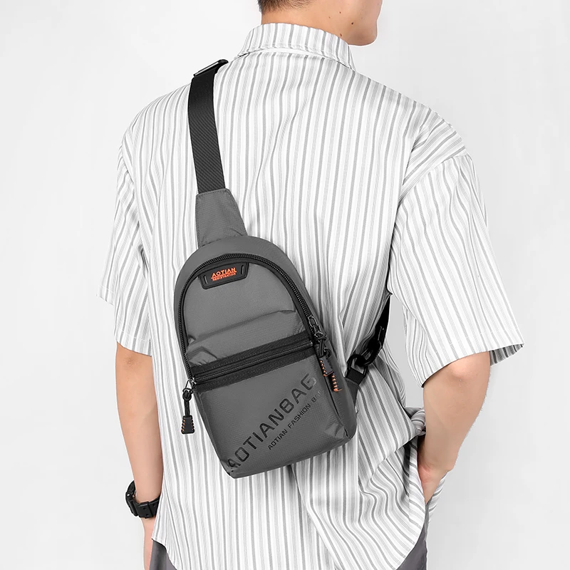 カジュアルナイロンチェストバッグ男性と女性のためのアウトドアサイクリングクロスボディバッグユニセックスフロントショルダーバッグレジャージッパー開閉ソリッドカラー