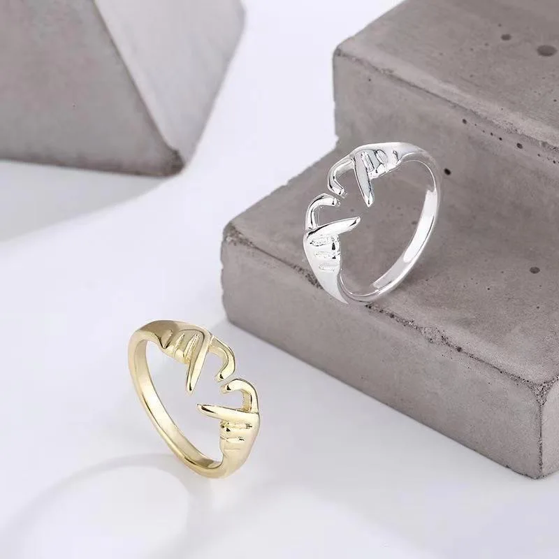 Hot selling romantic two handed heart to heart ring, European and American fashion, loving embrace hand, couple ring, give to gi image 4