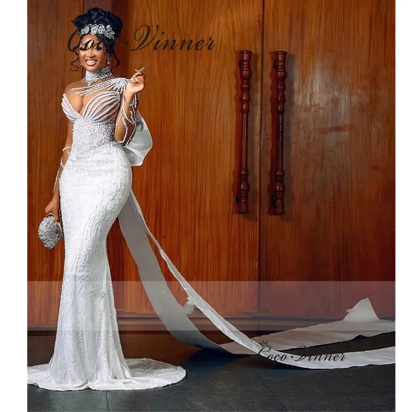 

Сексуальное свадебное платье русалки с иллюзорными рукавами по индивидуальному заказу для женщин, расшитое бисером, с большим бантом, 2025, роскошные свадебные платья W1445