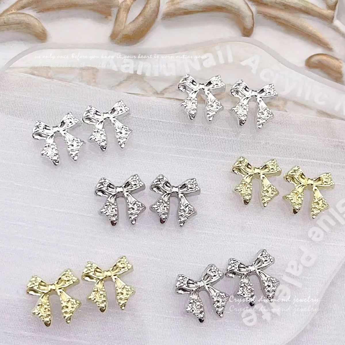 

20PCS multi-color bow nail accessories, light luxury hollow simple alloy nail accessories