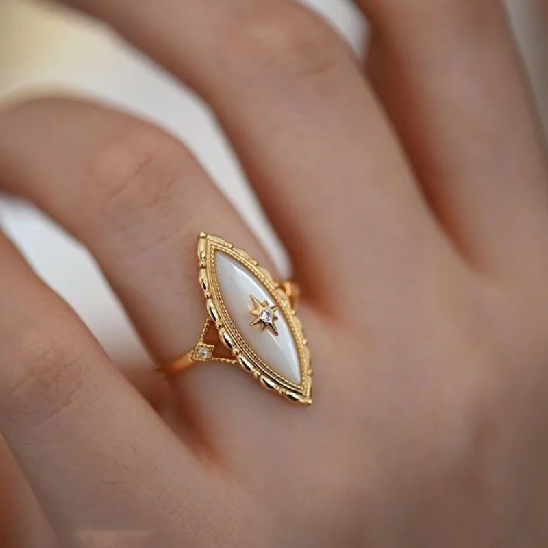 

Ancient Gold Craft Court style horse-eye pointed White Fritillaria rings for women Vintage Light Luxury Design Sense Jewelry