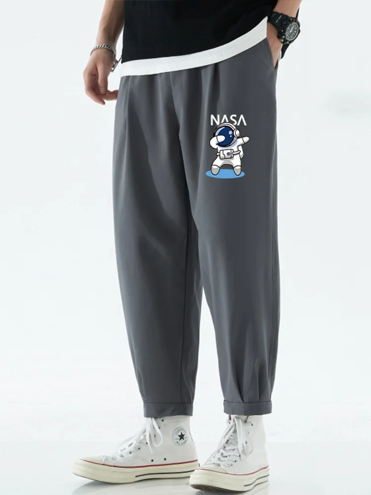 

Мужские летние тонкие повседневные спортивные брюки из ледяного шелка, свободные молодежные брюки-харланы, модные свободные спортивные брюки с манжетами