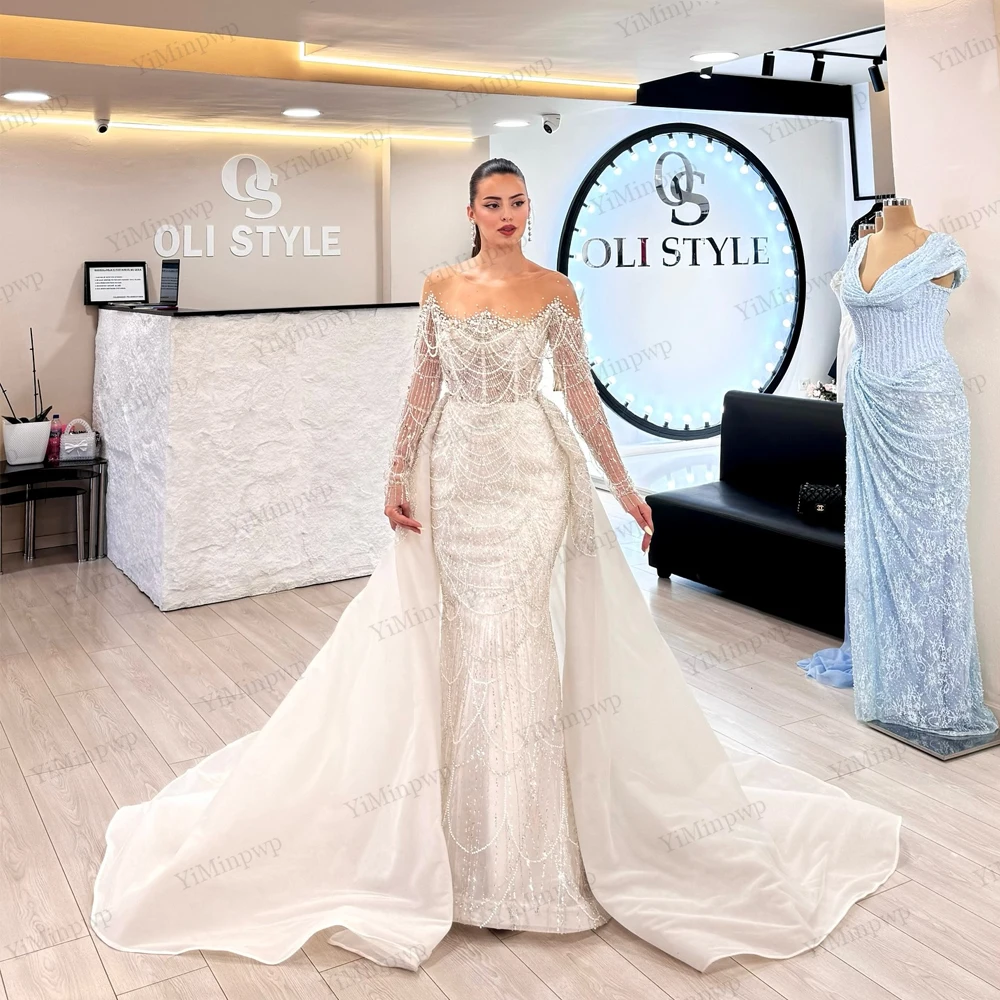 Vestidos de novia de sirena de lujo 2025 con tren desmontable, vestidos de novia con cuentas de cristales de manga larga, corsé con cuello redondo personalizado