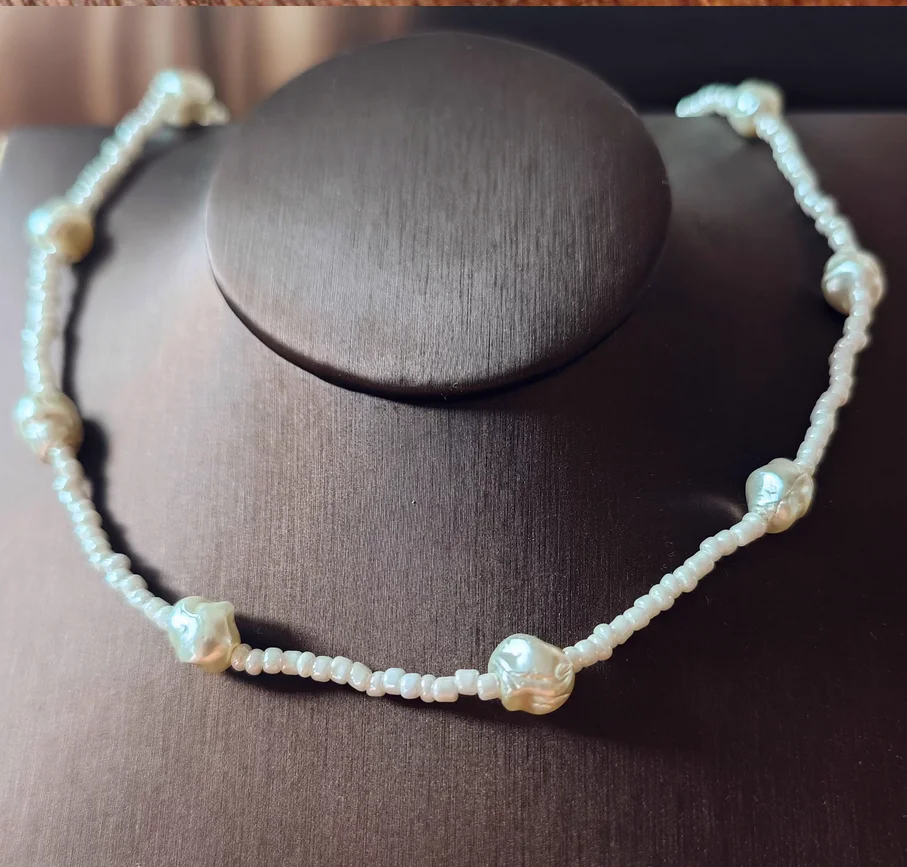 Baby's adem glazen parelketting