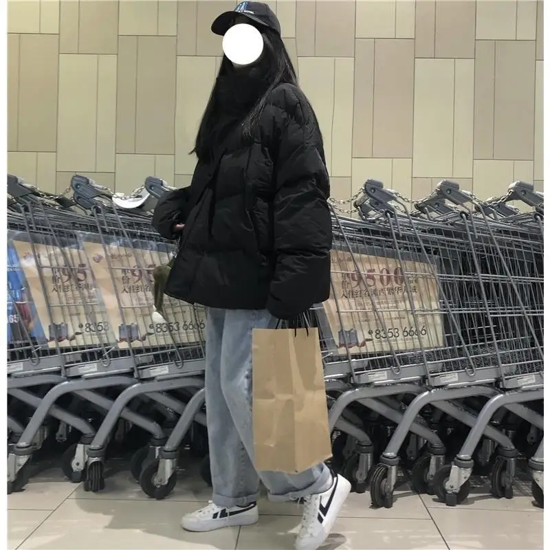 

Puffer Parkas Extreme Cold Womens Waist Adjustable Cinched Gathered Drawn Pulled Narrowed Constricted Tightened Belt Buckle Cord