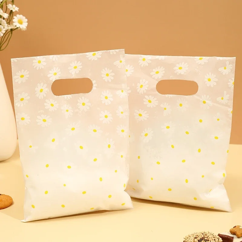 100 unids/pack bolsa de regalo con estampado de margaritas con asa de plástico, bolsa de regalo de plástico, perfecta para el día de la madre, fiestas, vacaciones