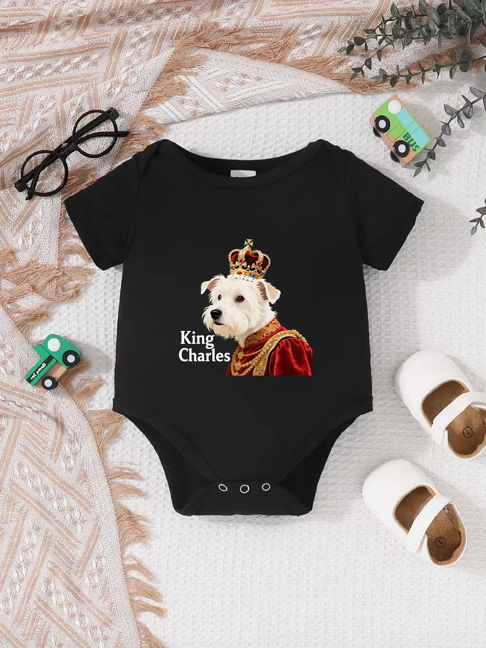 

Playful letter-printed baby short-sleeve triangle bodysuit. Button closure for easy dressing