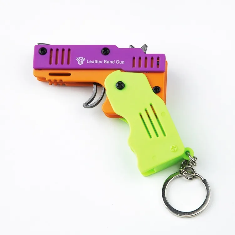 Brand Alloy+plastic M1 Mini Pendant Folding Rubber Band Gun with 6 Consecutive Firing Child Soft Bullet Gun Toy Gift Bullet Guns