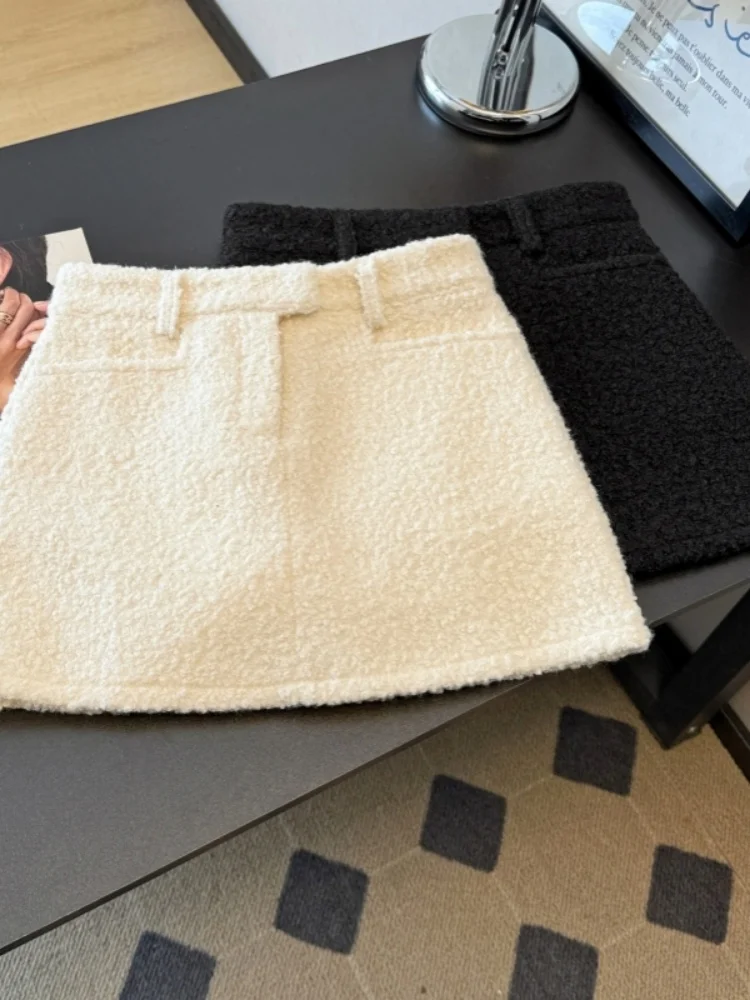 SMTHMA Schwarz-Weiß-Wollrock im französischen eleganten Stil mit niedriger Taille und blendendem Modedesign-Kurzrock für Damen