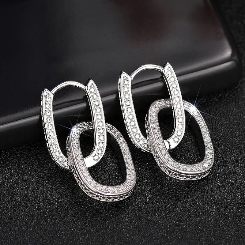 Huitan Spezielle Kreis Verbunden Kreis Design Frauen Tropfen Ohrringe Luxus Zubehör Intarsien Glänzenden CZ Trendy Schmuck für Party Täglich
