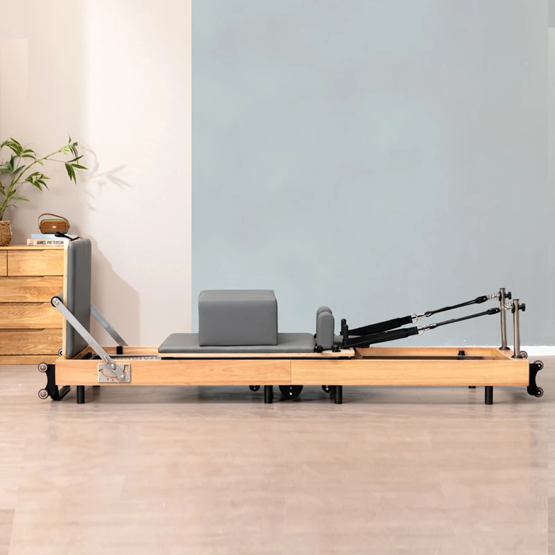 مصلح بيلاتيس عالي الجودة من خشب البلوط قابل للطي سريع الطي لليوجا معدات لياقة بدنية كبيرة سرير بيالتيس منزلي تجاري