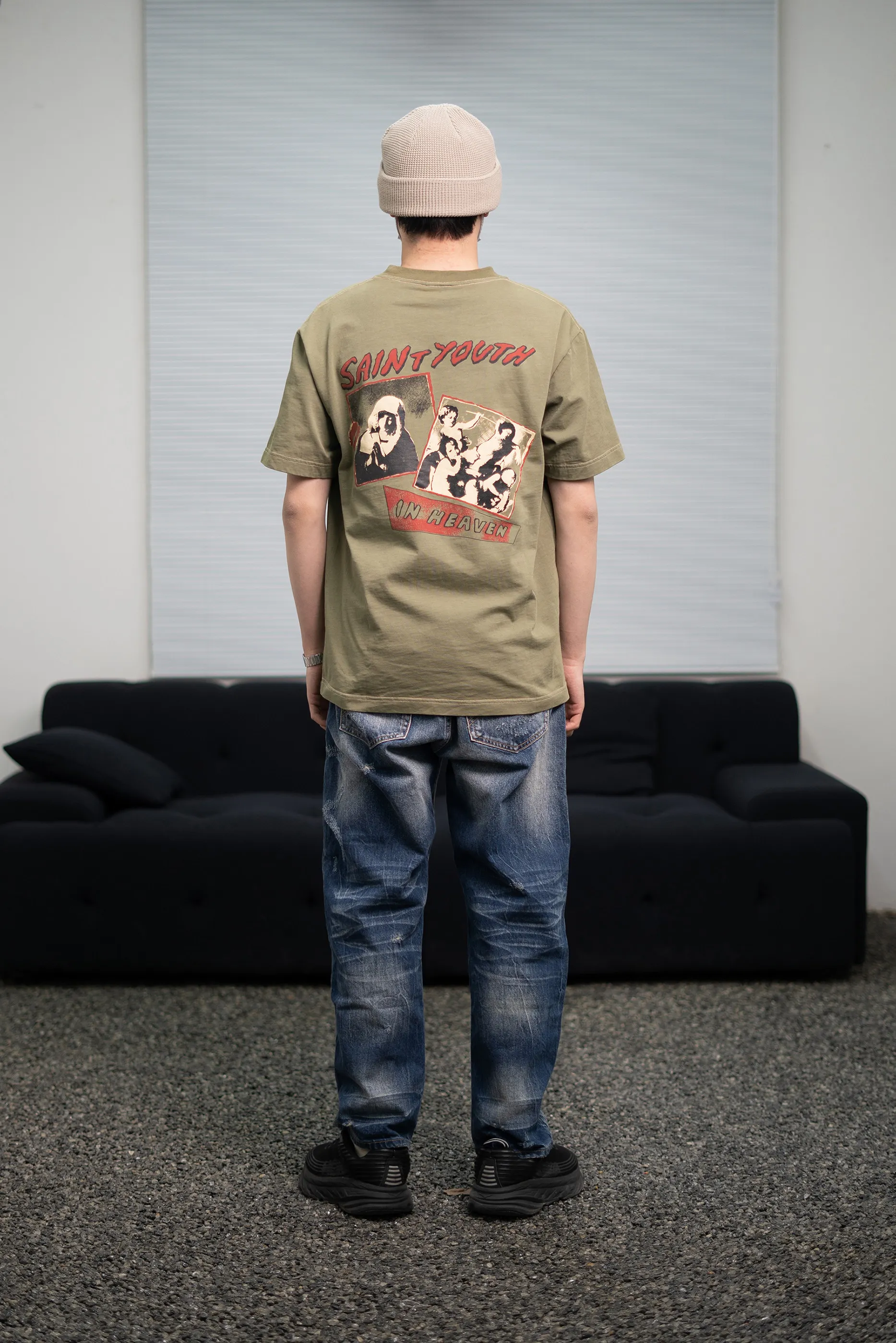 Saint Michael washed and old captain with the same army green short-sleeved T-shirt