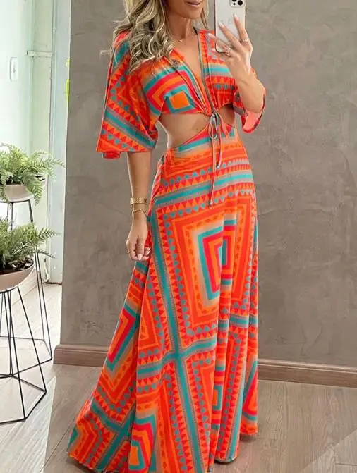 

Colored geometric patterns all over the body bat sleeves waist baring straps long skirt with a waistband elegant temperament