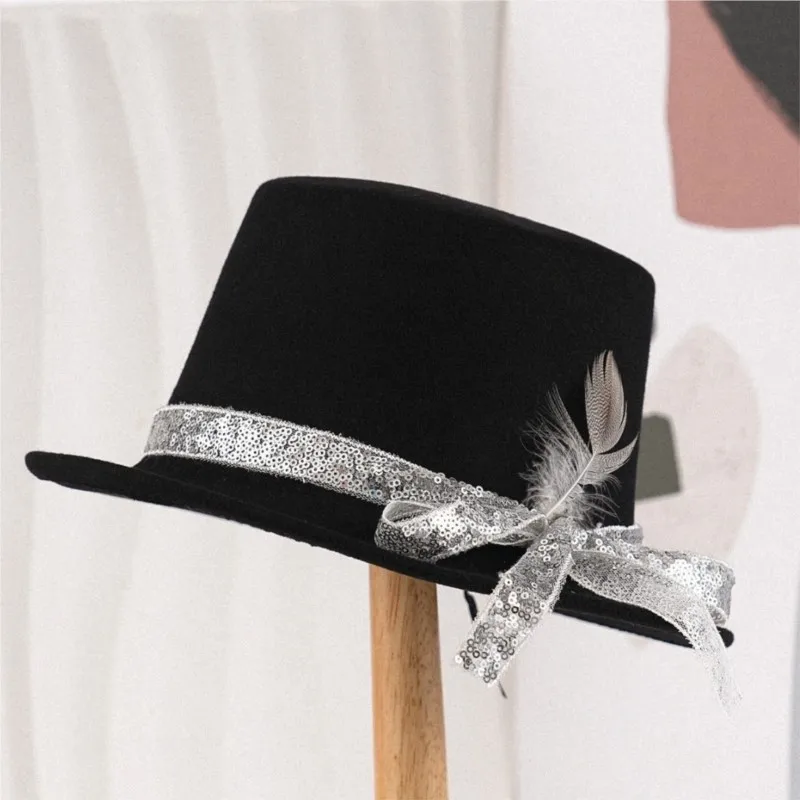 Black woolen flat top hat fashionable sequined ribbon feather decorative versatile for parties
