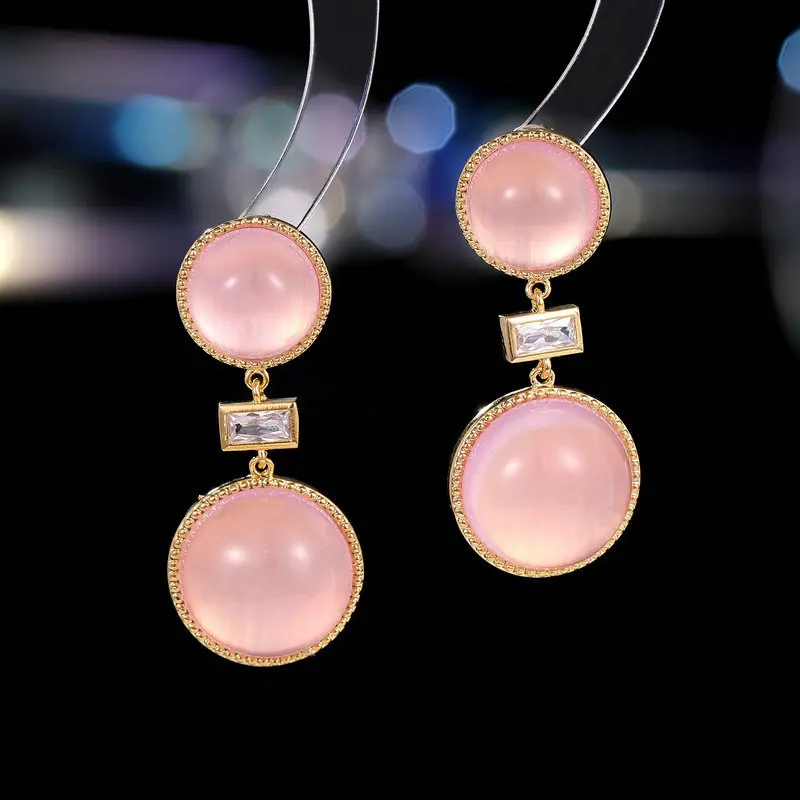 

Versatile Fashion Sweet Temperament French Simple Light Luxury High-end Geometric Round Cat's Eye Stone Earrings